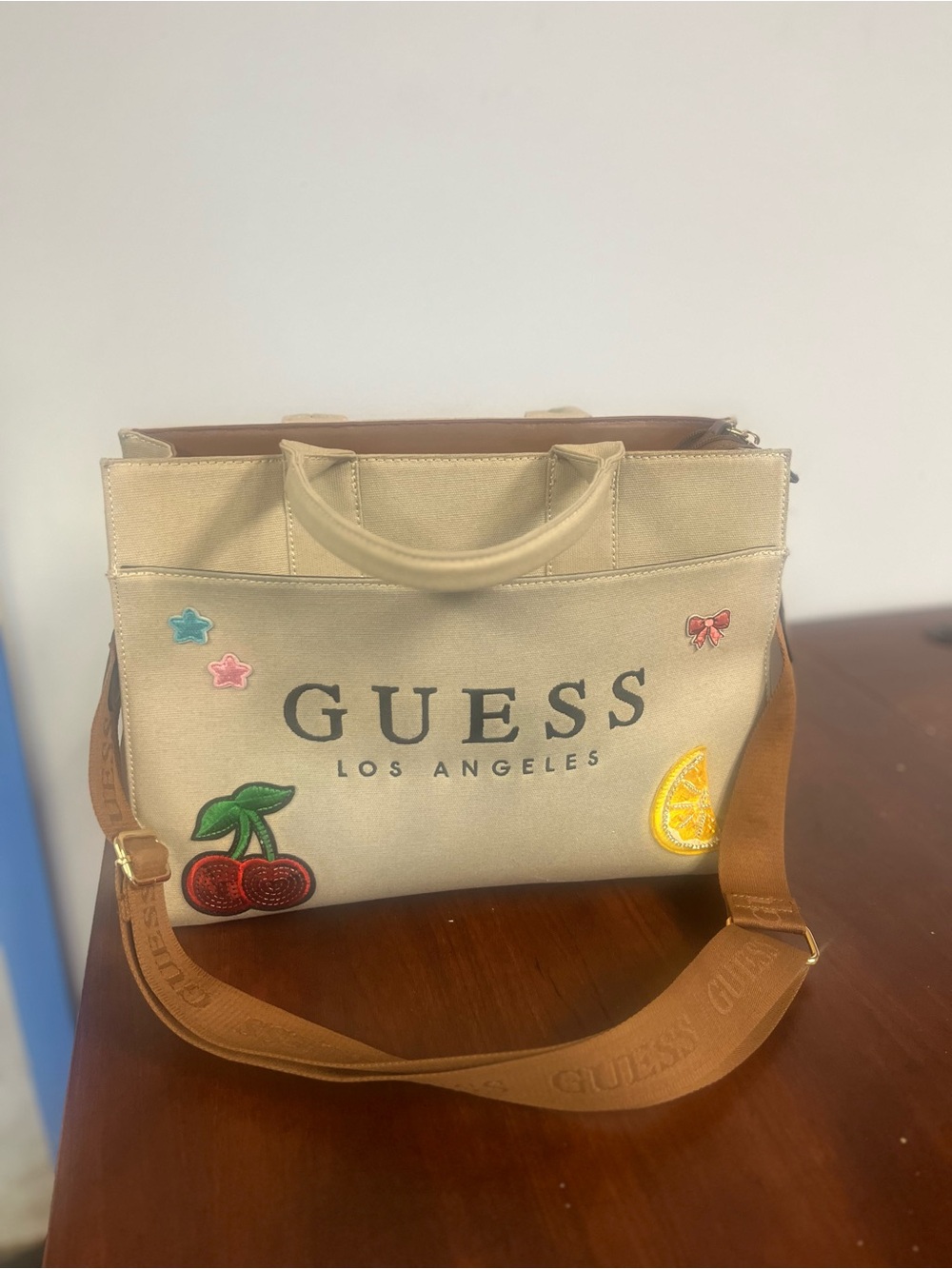 GUESS Beige Canvas Crossbody Tote with Patch Accents
